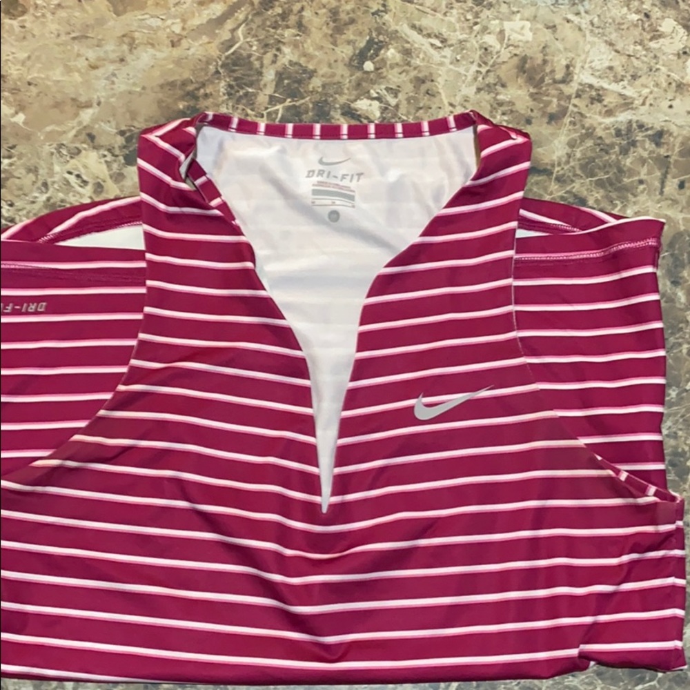 Medium Nike dri fit top.